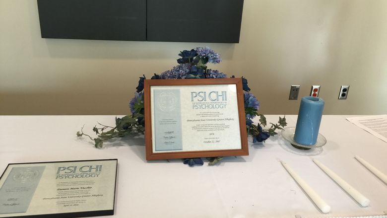 Psi Chi charter plaque at induction ceremony