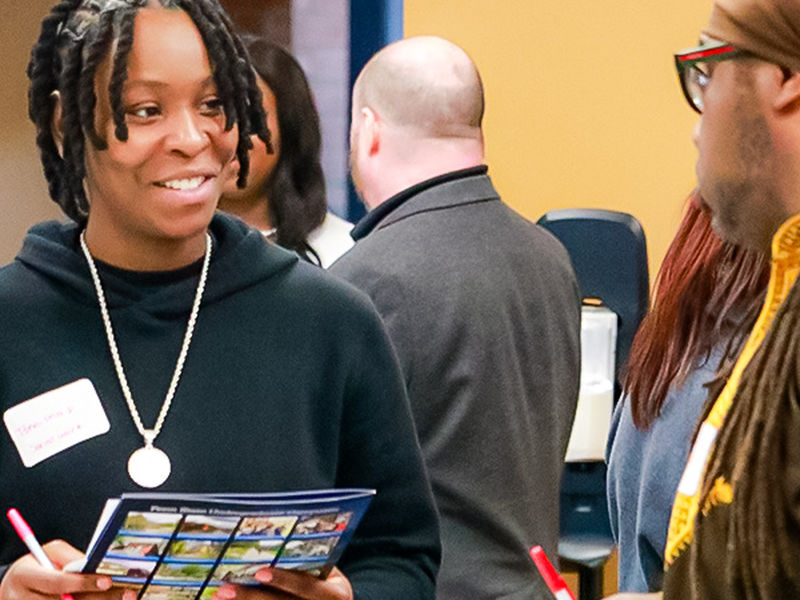 People networking at a Social Work Networking event.