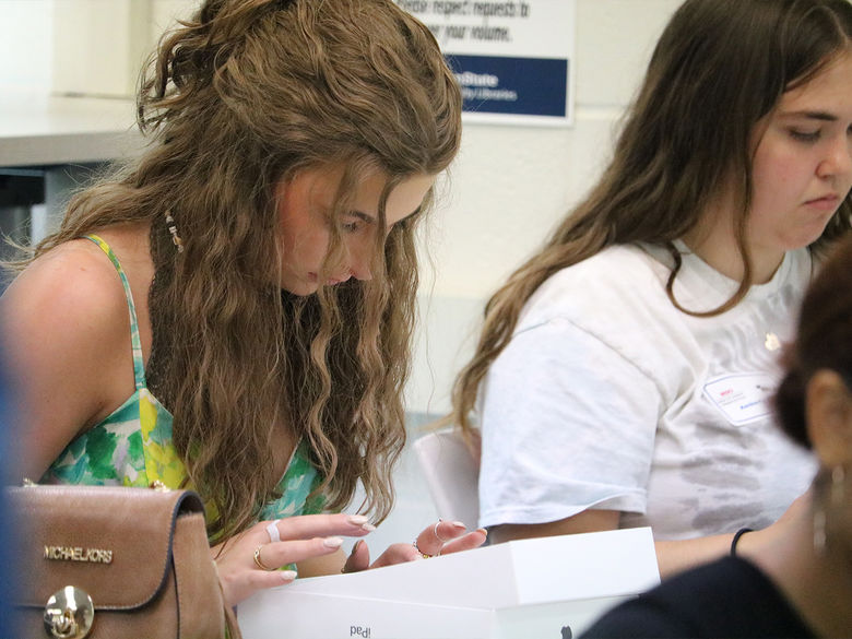 Student exploring Penn State's 275+ Majors via iPad