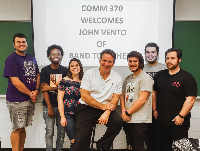 Penn State Greater Allegheny communications students pose with John Vento, founder of Pittsburgh’s Band Together. 