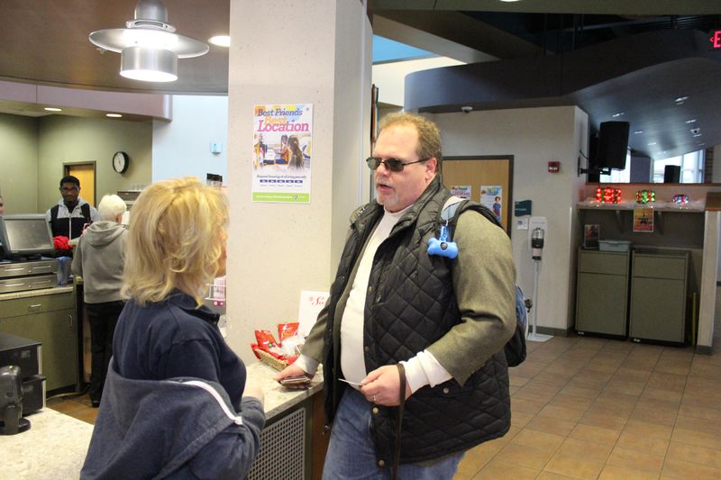 Jerry Pastories talking to Café Metro Worker