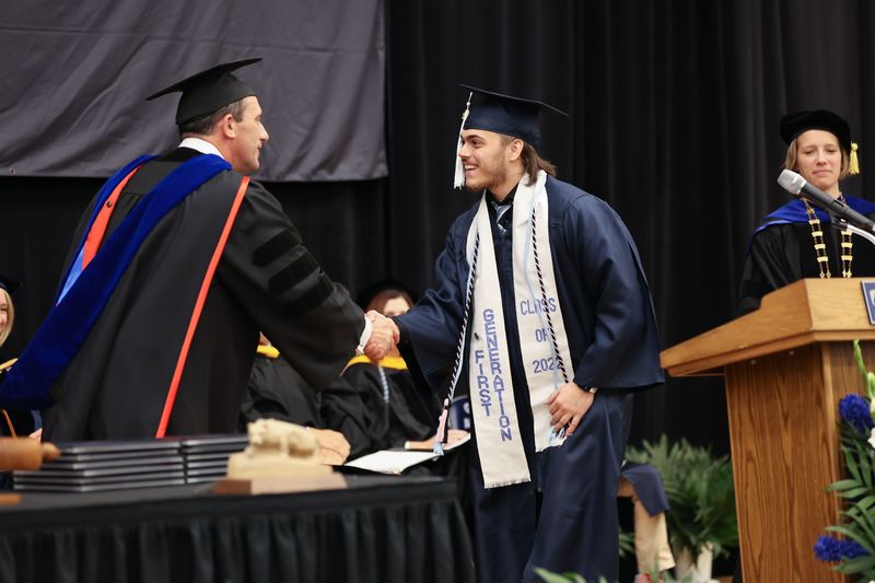 Student Marshal and Information Sciences and Technology (B.S.) Degree Candidate, Nicholas Anthony Trunzo accepting an Academic Excellence Award