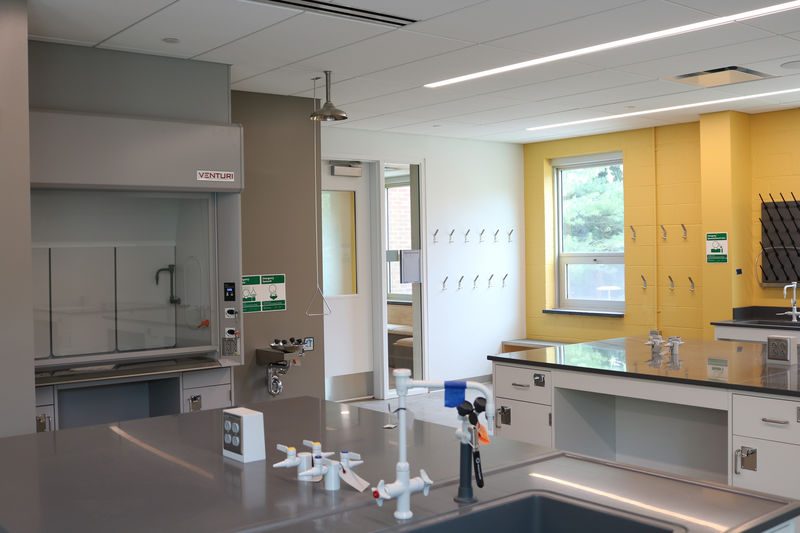 Lab space with brightly painted wall. 