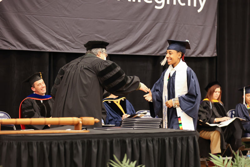 Business (B.S.) Degree Candidate, Ilana M. Ballard, receives her diploma
