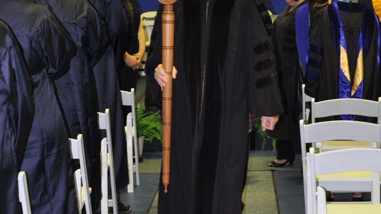man holding a mace