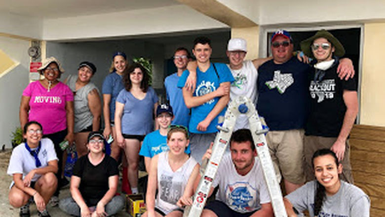 Students and Staff smiling for photo in Puerto Rico