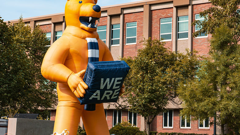 Image of an inflatable Nittany Lion on the buck lawn.