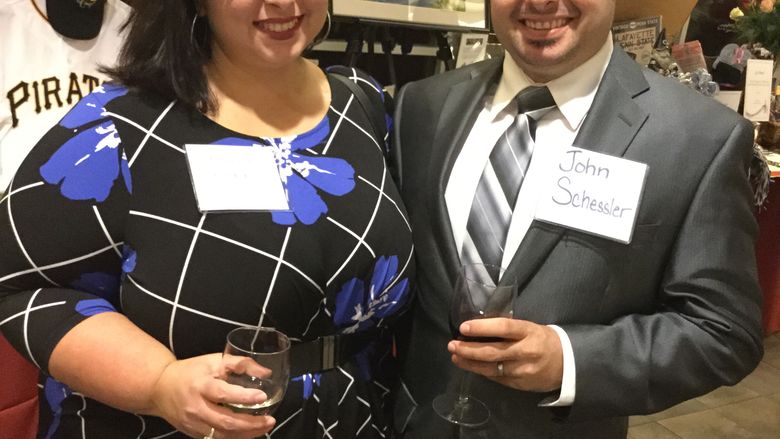 man and woman smiling