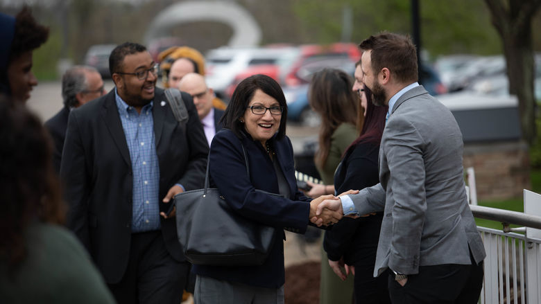 President-elect Neeli Bendapudi shakes hands