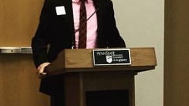man at podium