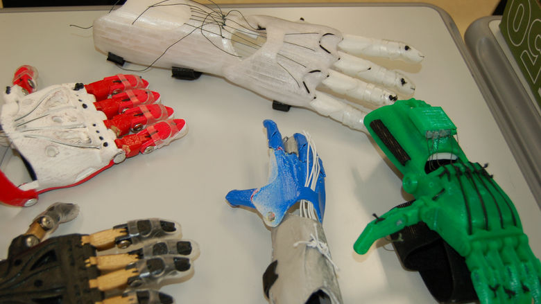prosthetic hands on table