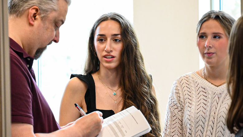 person scoring a presentation