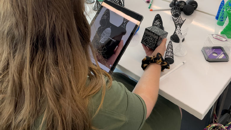 Student using iPad in math class