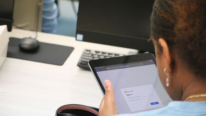 person looking at an iPad screen