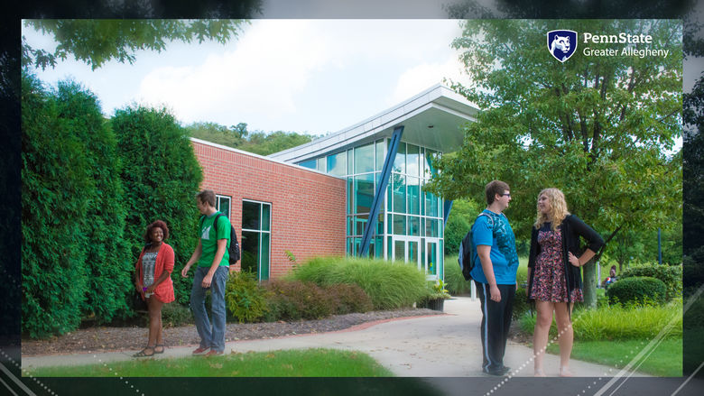 Students standing on walkway talking