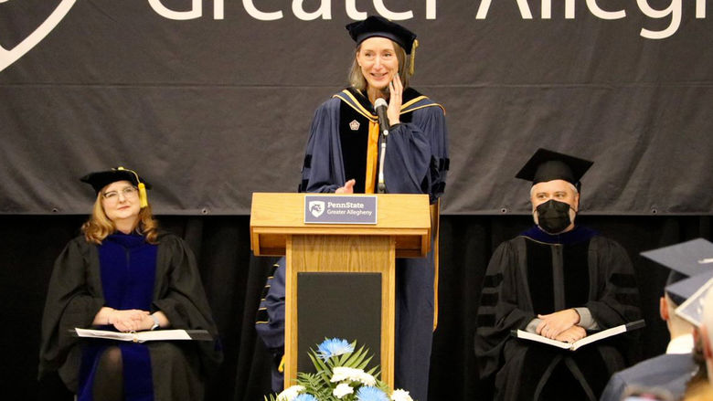 Person speaking at a podium