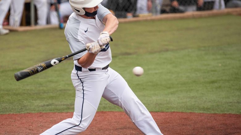 Penn State Greater Allegheny Baseball Player about to hit an incoming pitch.