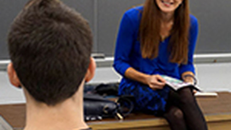 Teacher talking to student