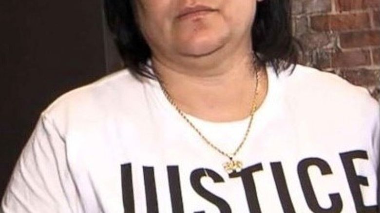 Woman straight faced wearing Justice for Antwon t-shirt