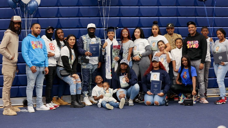 Business (B.S.) Degree Candidate, Ilana M. Ballard, celebrating her graduation with her family.