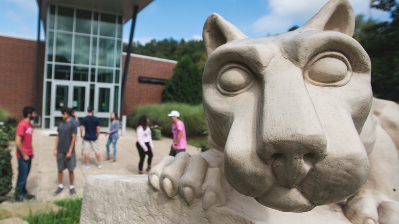 A close up photo of the Lion Shrine outside Penn State Greater Allegheny's Frable Building on a nice day.