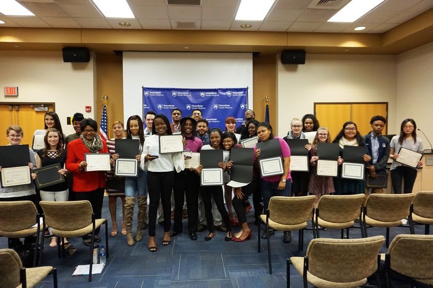 Honorees of the 2018 EPIC and Academic Achievement Awards Holding Awards.