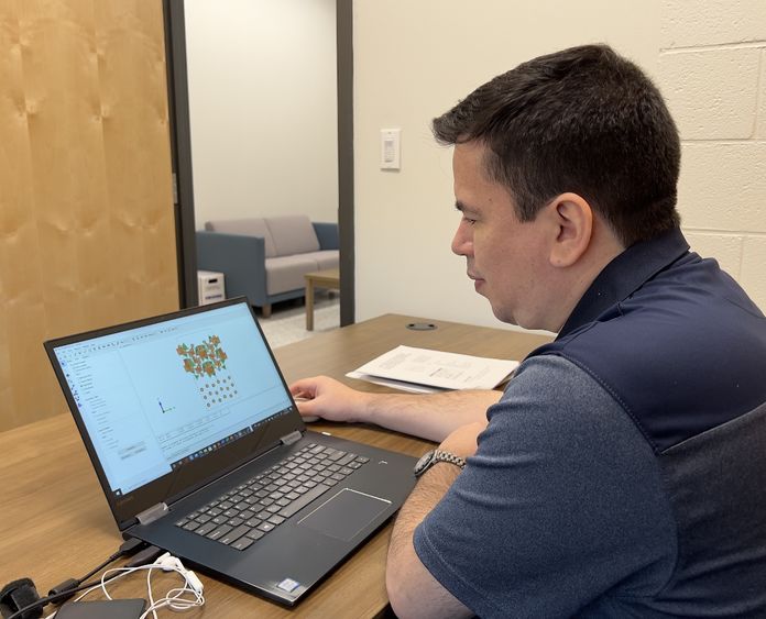 Man working on computer in office