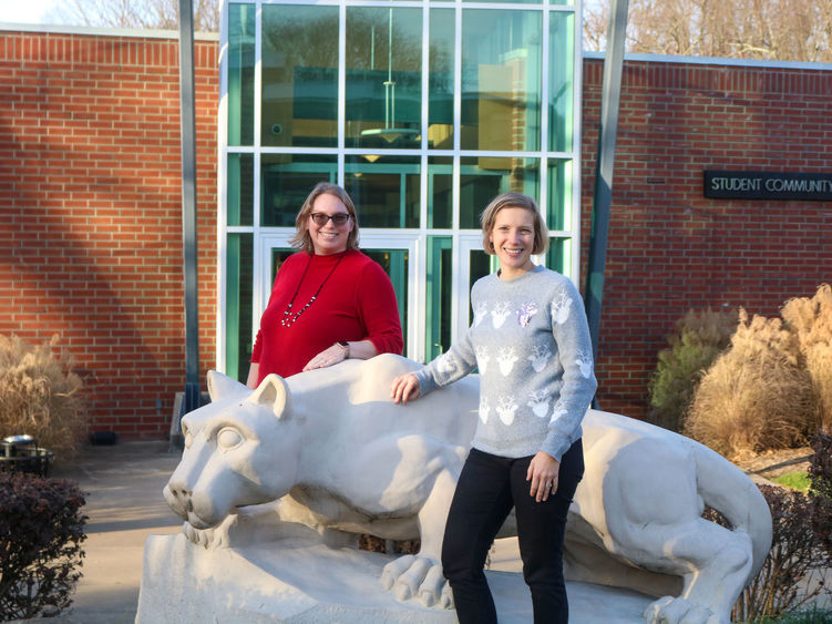 two women posing at the Greater Allegheny Lion Shrine