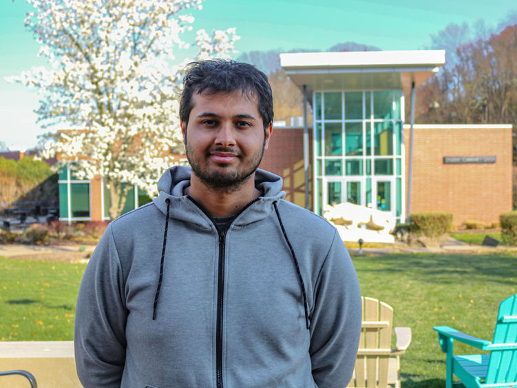 student outside smiling 